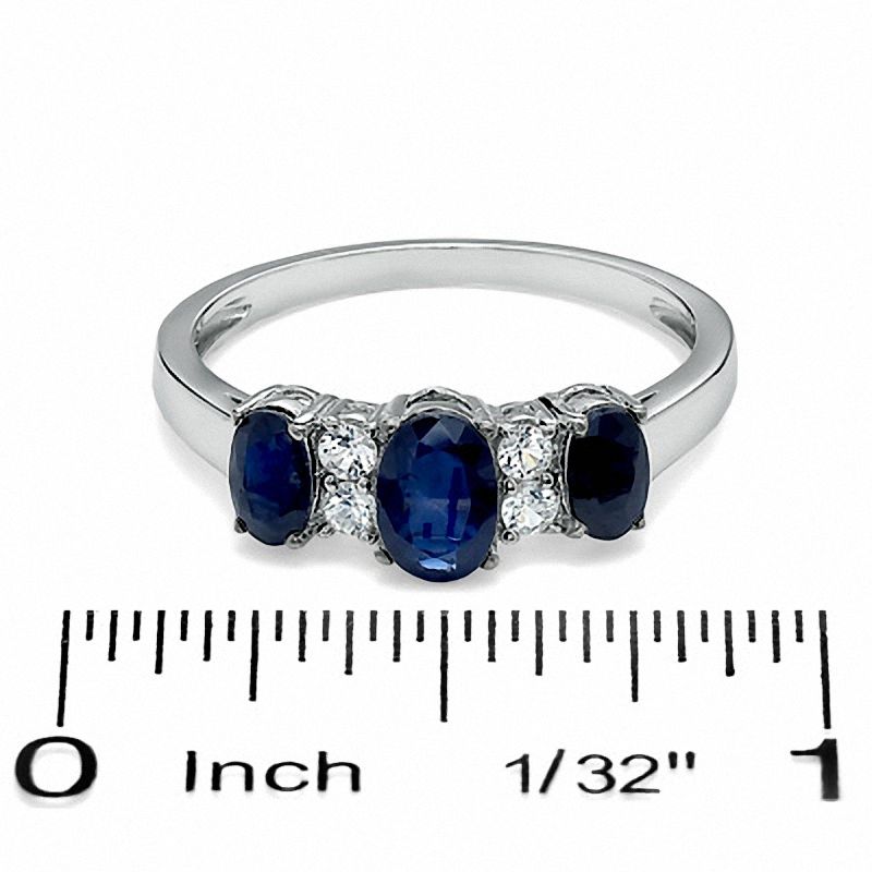 Oval Blue Sapphire Three Stone Ring in 10K White Gold with White