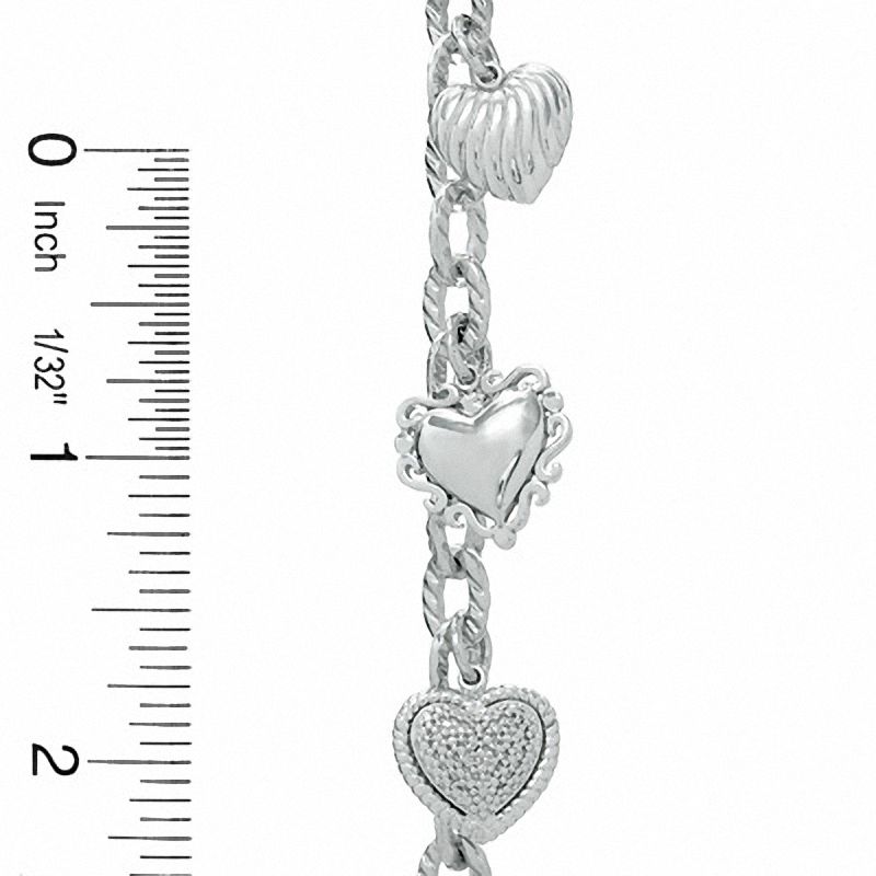 1/5 CT. T.W. Diamond Heart Assorted Charm Bracelet in Sterling Silver