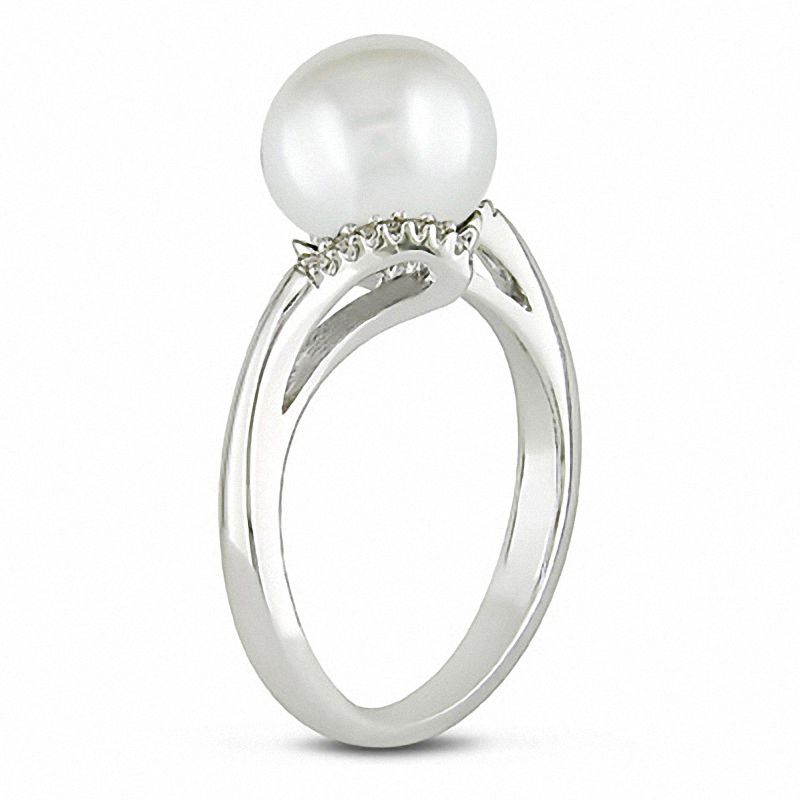 9.0-10.0mm Button Freshwater Cultured Pearl and 1/20 CT. T.W. Diamond Bypass Ring in Sterling Silver