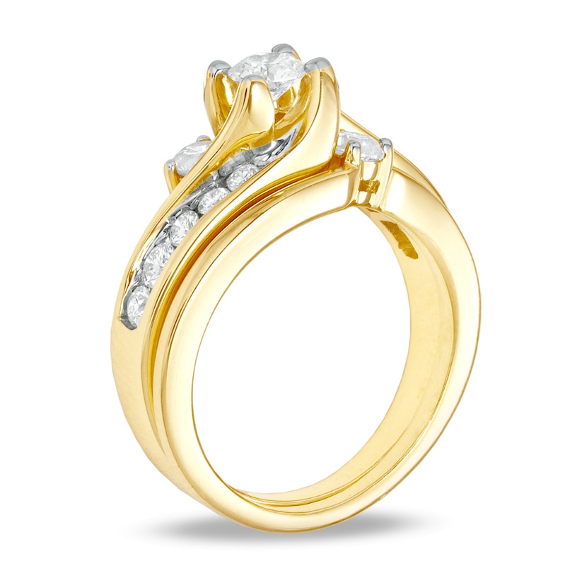 1 CT. T.W. Diamond Three Stone Swirl Bridal Set in 14K Gold