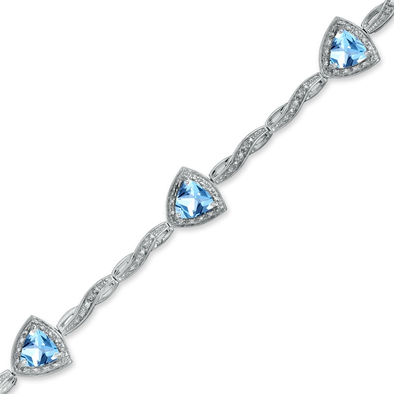 Main Image 1 of 6.0mm Trillion-Cut Blue Topaz Bracelet in Sterling Silver with Diamond Accents - 7.25"