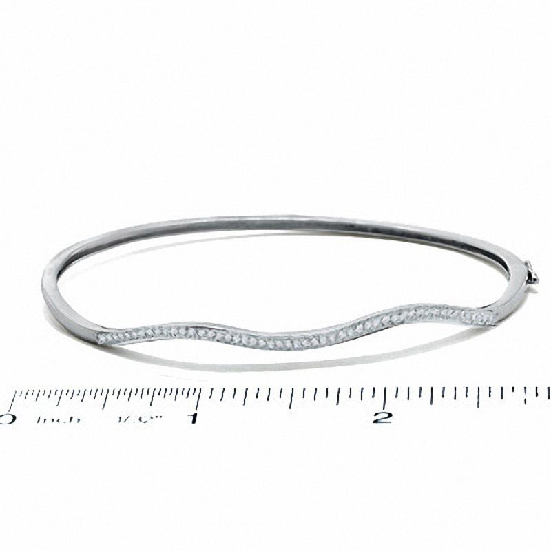 1/7 CT. T.W. Diamond Wavy Bangle in Sterling Silver