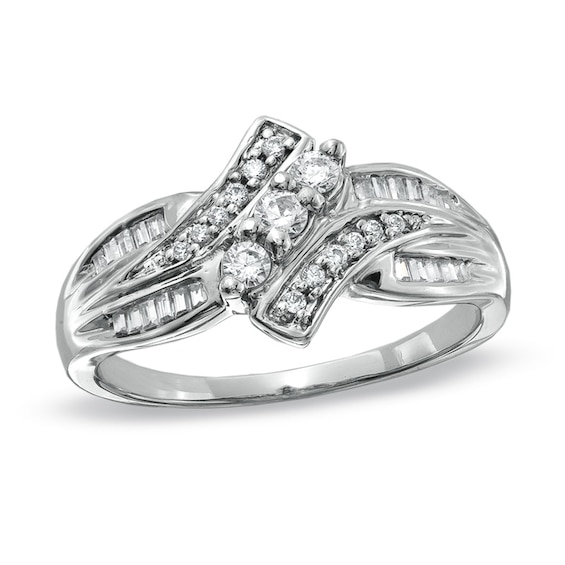 1/3 CT. T.w. Diamond Three Stone Swirl Bypass Ring in 10K Gold