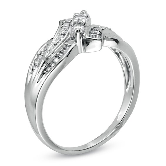 1/3 CT. T.w. Diamond Three Stone Swirl Bypass Ring in 10K Gold