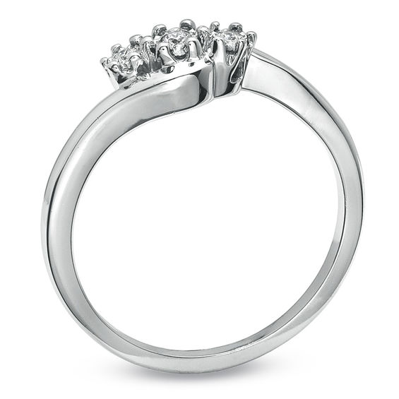 1/20 CT. T.w. Diamond Three Stone Bypass Promise Ring in Sterling Silver