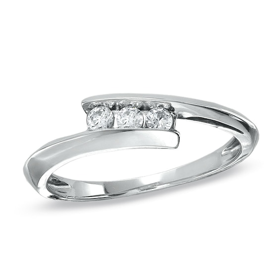 1/5 CT. T.w. Diamond Three Stone Bypass Ring in 10K White Gold