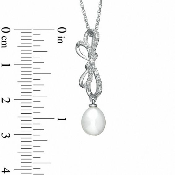 7.0-7.5mm Freshwater Cultured Pearl and White Topaz Bow Pendant in Sterling Silver