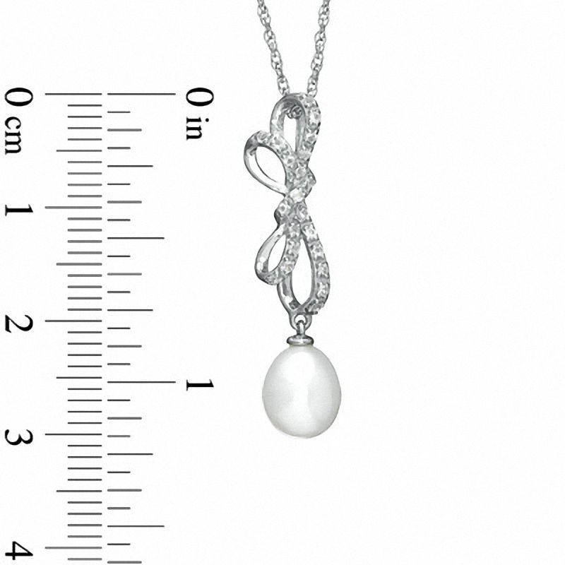 7.0 - 7.5mm Cultured Freshwater Pearl and White Topaz Bow Pendant in Sterling Silver