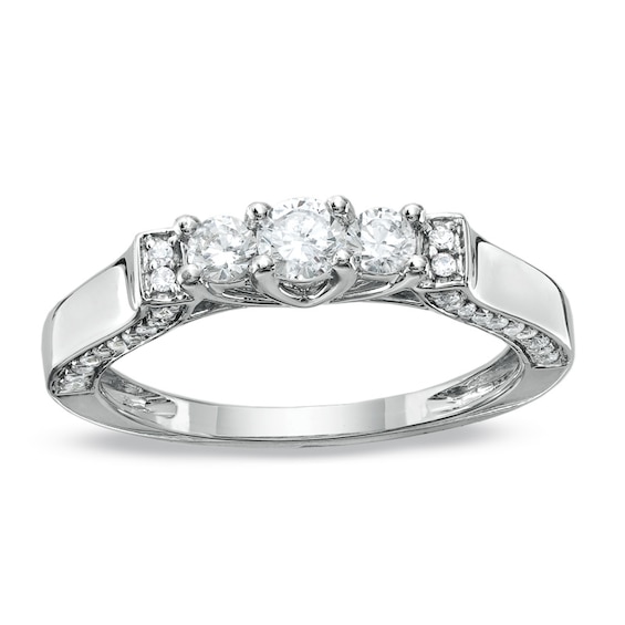 1/2 CT. T.w. Diamond Three Stone Band in 10K White Gold