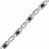 Thumbnail Image 0 of Oval Blue Sapphire Heart and "X" Link Bracelet in Sterling Silver - 7.25"