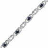 Thumbnail Image 1 of Oval Blue Sapphire Heart and "X" Link Bracelet in Sterling Silver - 7.25"
