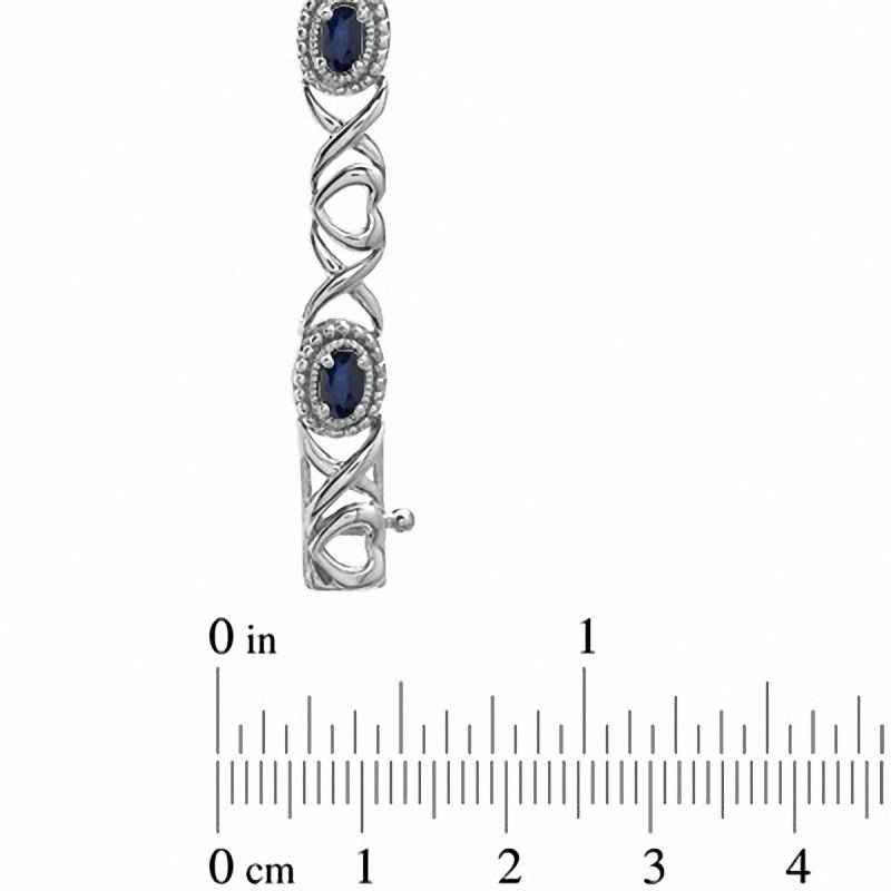 Oval Blue Sapphire Heart and "X" Link Bracelet in Sterling Silver - 7.25"