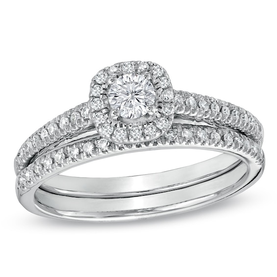 1/ CT. T.w. Diamond Frame Bridal Set in 14K White Gold