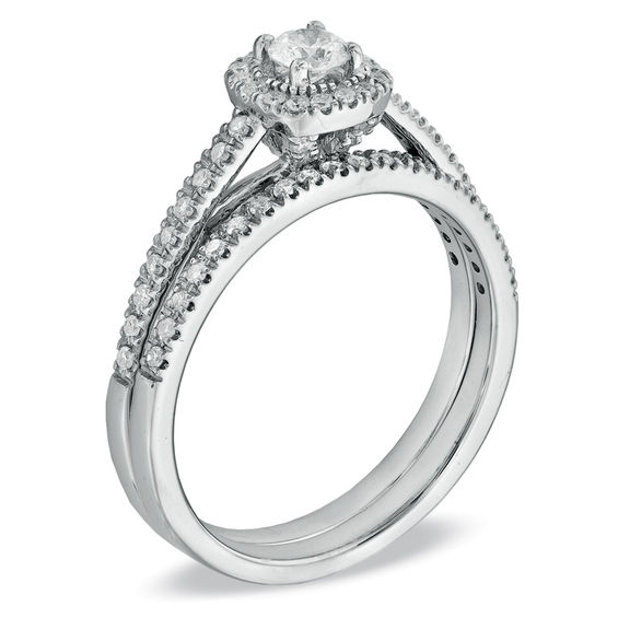 1/ CT. T.w. Diamond Frame Bridal Set in 14K White Gold