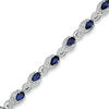 Thumbnail Image 0 of Pear-Shaped Lab-Created Blue Sapphire and 1/10 CT. T.W. Diamond Bracelet in Sterling Silver