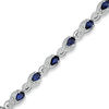 Thumbnail Image 1 of Pear-Shaped Lab-Created Blue Sapphire and 1/10 CT. T.W. Diamond Bracelet in Sterling Silver