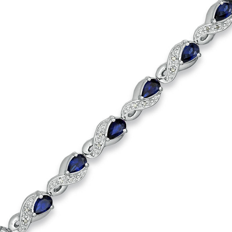 Main Image 1 of Pear-Shaped Lab-Created Blue Sapphire and 1/10 CT. T.W. Diamond Bracelet in Sterling Silver