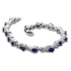 Thumbnail Image 1 of Pear-Shaped Lab-Created Blue Sapphire and 1/10 CT. T.W. Diamond Bracelet in Sterling Silver