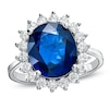 Thumbnail Image 0 of Oval Blue Sapphire and 5/8 CT. T.W. Diamond Frame Engagement Ring in 14K White Gold