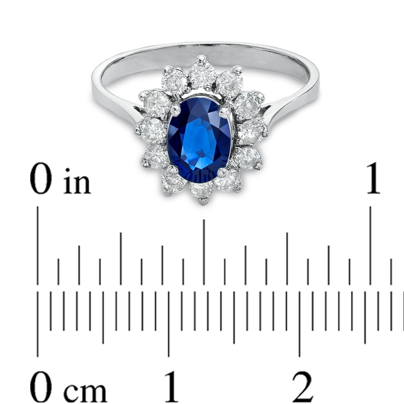 Oval Blue Sapphire and 1/2 CT. T.W. Diamond Frame Engagement Ring in 14K White Gold