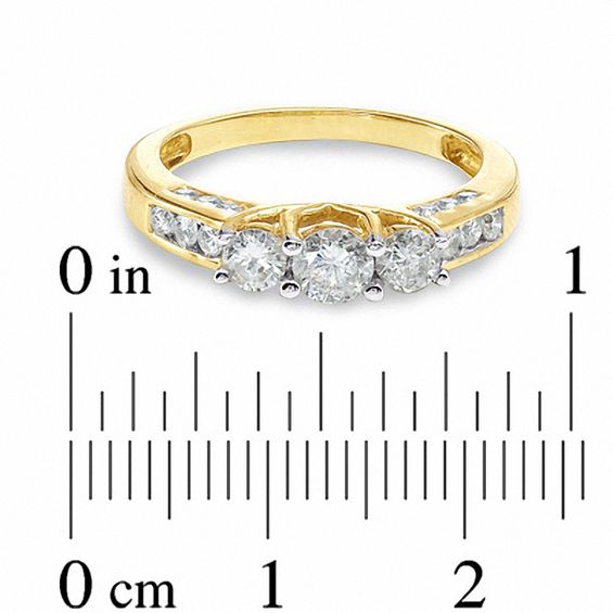 1 CT. T.w. Diamond Three Stone Ring in 10K Gold - Size 7