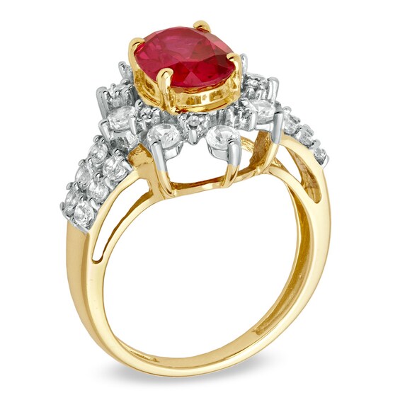 Oval Lab-Created Ruby and White Sapphire Frame Ring in 10K Gold with Diamond Accents