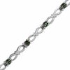 Thumbnail Image 1 of Mystic Fire® Topaz and Diamond Accent Bracelet in Sterling Silver - 7.25"