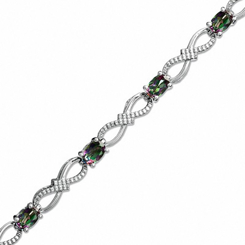 Main Image 1 of Mystic Fire® Topaz and Diamond Accent Bracelet in Sterling Silver - 7.25"