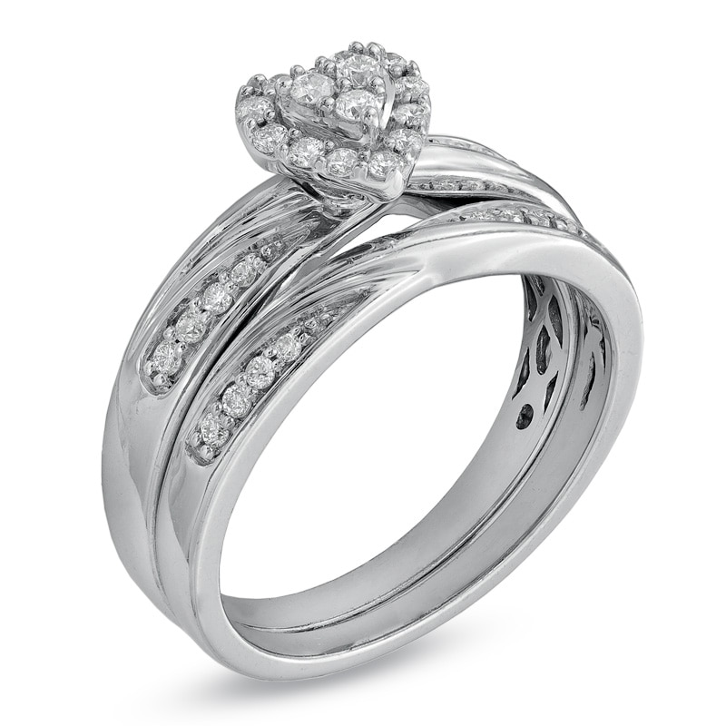 1/3 CT. T.W. Diamond Heart Frame Slant Comfort Fit Wedding Ensemble in 10K White Gold - Size 7 and 10