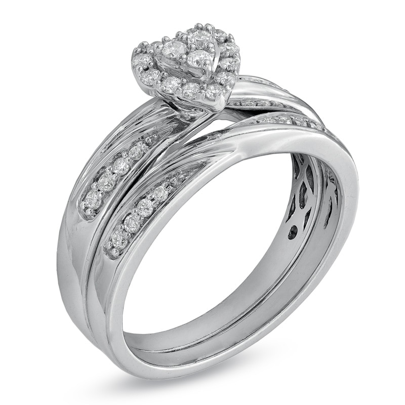 1/3 CT. T.W. Diamond Heart Frame Slant Comfort Fit Wedding Ensemble in ...