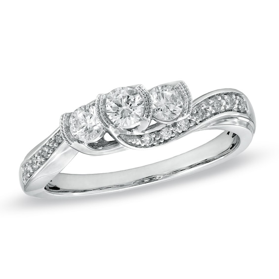 1/2 CT. T.w. Diamond Three Stone Engagement Ring in 14K White Gold