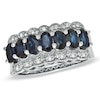 Thumbnail Image 1 of Oval Blue Sapphire and 1/10 CT. T.W. Diamond Band in Sterling Silver