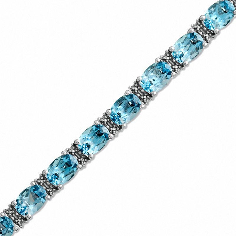 Oval Blue Topaz and Diamond Accent Line Bracelet in Sterling Silver - 7 ...