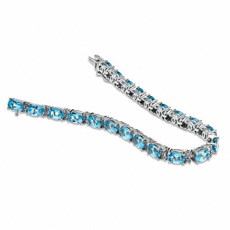 Main Image 2 of Oval Blue Topaz and Diamond Accent Line Bracelet in Sterling Silver - 7.25"