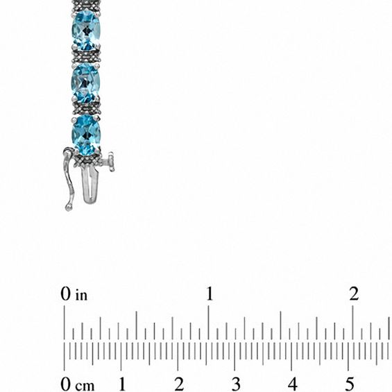 Oval Blue Topaz and Diamond Accent Line Bracelet in Sterling Silver - 7.25"