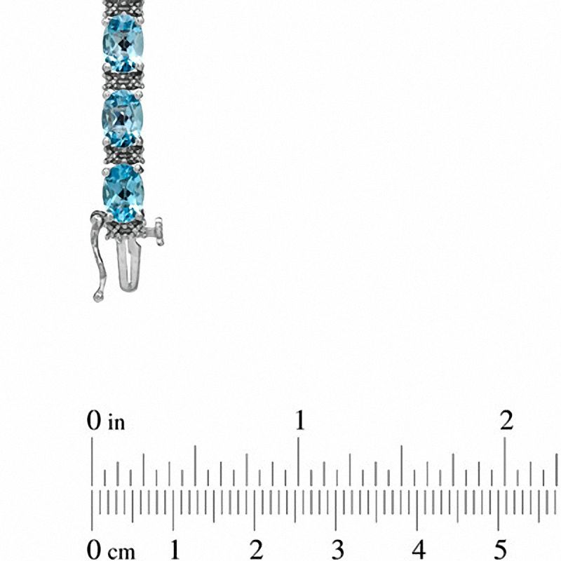 Main Image 3 of Oval Blue Topaz and Diamond Accent Line Bracelet in Sterling Silver - 7.25"