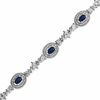 Thumbnail Image 0 of Oval Blue Sapphire and 1/10 CT. T.W. Diamond Bracelet in Sterling Silver