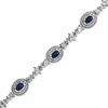 Thumbnail Image 1 of Oval Blue Sapphire and 1/10 CT. T.W. Diamond Bracelet in Sterling Silver