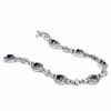 Thumbnail Image 1 of Oval Blue Sapphire and 1/10 CT. T.W. Diamond Bracelet in Sterling Silver