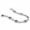 Thumbnail Image 2 of Oval Blue Sapphire and 1/10 CT. T.W. Diamond Bracelet in Sterling Silver