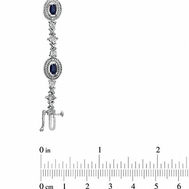 Main Image 3 of Oval Blue Sapphire and 1/10 CT. T.W. Diamond Bracelet in Sterling Silver