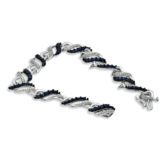 Blue Sapphire and 1/3 CT. T.w. Diamond Swirl Bracelet in Sterling Silver