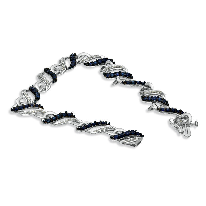 Main Image 2 of Blue Sapphire and 1/3 CT. T.W. Diamond Swirl Bracelet in Sterling Silver
