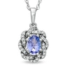 Thumbnail Image 1 of Oval Tanzanite and 1/5 CT. T.W. Diamond Swirl Pendant in 10K White Gold