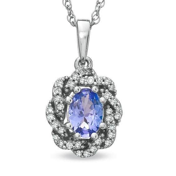 Oval Tanzanite and 1/5 CT. T.w. Diamond Swirl Pendant in 10K White Gold