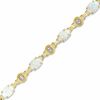 Thumbnail Image 0 of Lab-Created Opal and Diamond Accent Bracelet in 10K Two-Tone Gold