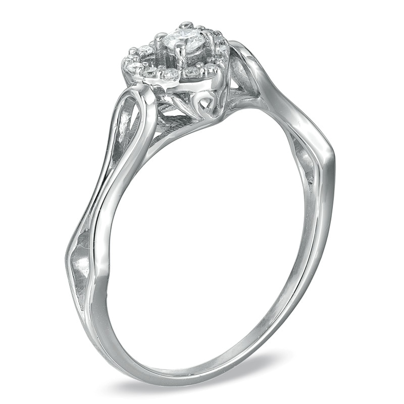 1/10 CT. T.W. Diamond Heart Framed Promise Ring in Sterling Silver