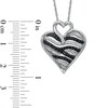 Thumbnail Image 2 of 1/4 CT. T.W. Enhanced Black and White Diamond Zebra Heart Pendant in Sterling Silver