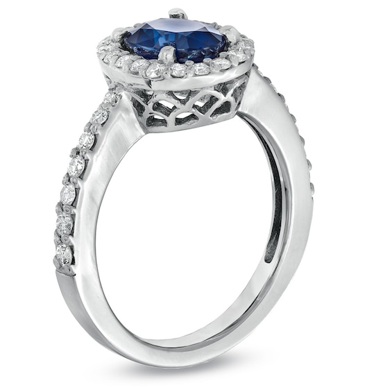 Oval Blue Sapphire and 1/2 CT. T.w. Diamond Frame Engagement Ring in 14K White Gold