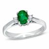 Thumbnail Image 1 of Oval Emerald and Diamond Accent Engagement Ring in 14K White Gold
